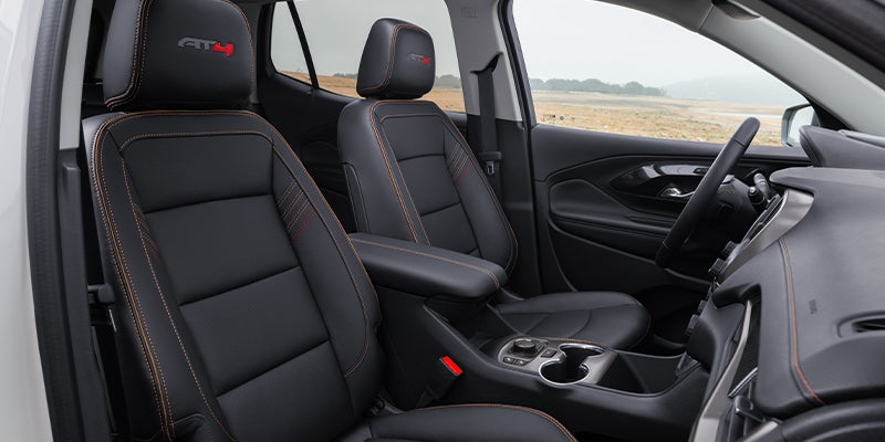 Black leather front seats of a GMC Terrain AT4.