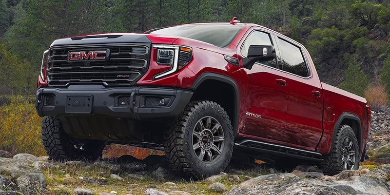 Red GMC Sierra off-road
